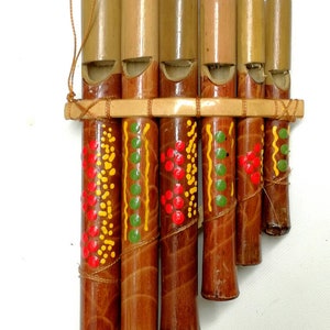 Bamboo Pan Flute Musical Wind Instruments. 6 pipes Sound original bamboo flute. African style painted on shiny bamboo pipes. By JNGcape