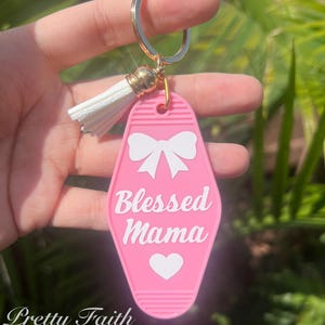 Christian Pink Motel Keychain