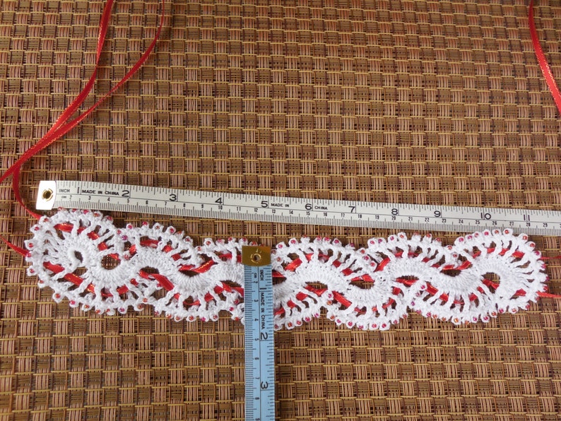Victorian inspired white and red ribbon with opalescent red glass accent beads. Gothic Beautiful handmade crochet and beaded choker