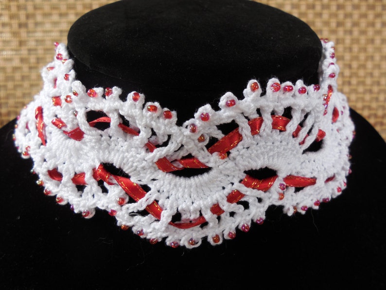 Victorian inspired white and red ribbon with opalescent red glass accent beads. Gothic Beautiful handmade crochet and beaded choker