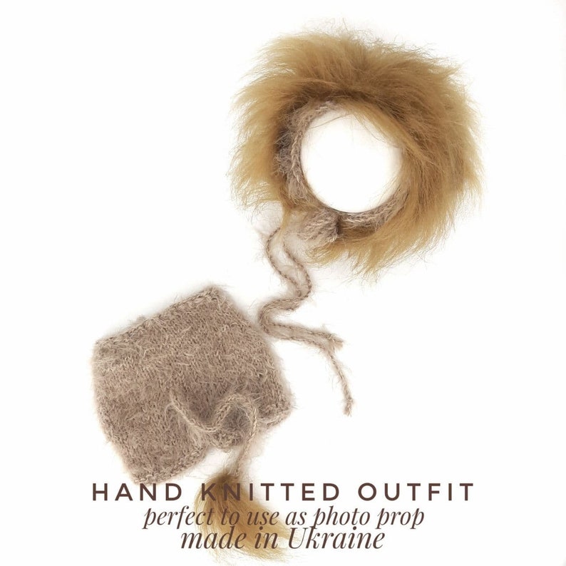 May include: Hand-knitted baby outfit in beige with a fluffy brown headband. The outfit is perfect to use as a photo prop and is made in Ukraine.