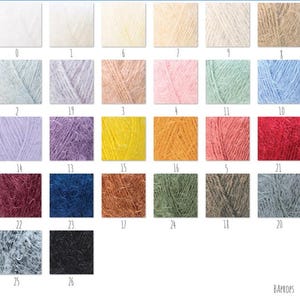 May include: A color chart of 26 yarn colors, including white, light blue, lavender, yellow, orange, pink, green, red, brown, blue, gray, and black.