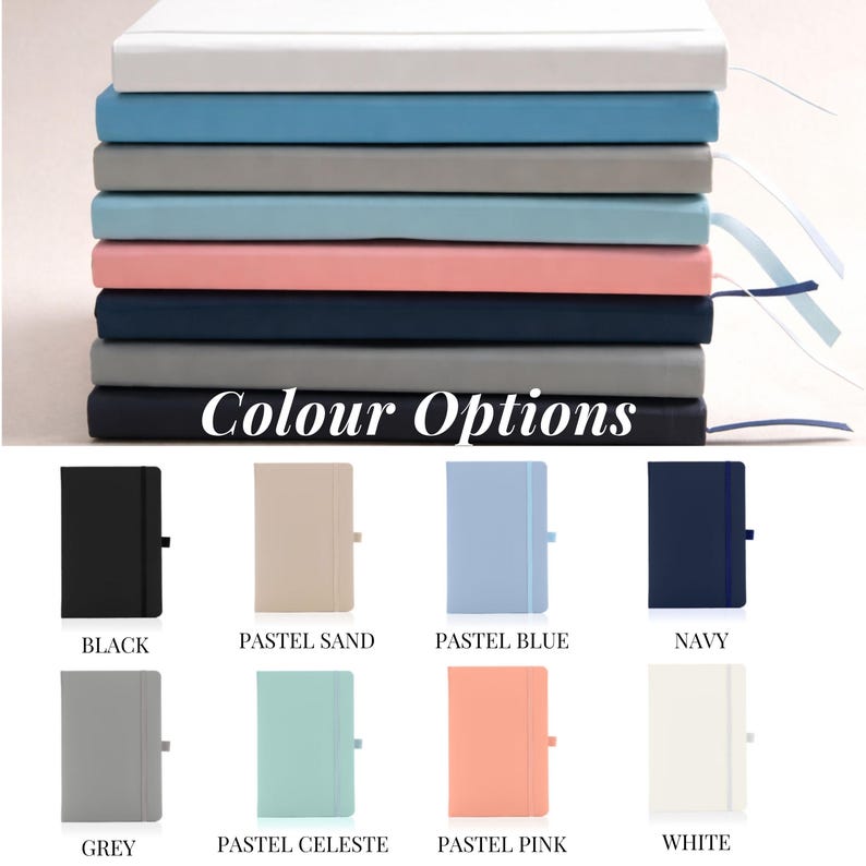 May include: A stack of eight rectangular notebooks in various solid colors including white, blue, gray, pink, and navy. Below the stack, eight individual notebooks are displayed in black, sand, blue, navy, gray, celeste, pink, and white with the text Colour Options.