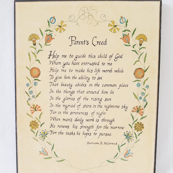 Parent's Creed decorative, vintage wall plaque has poem in calligraphy bordered by delicate leaves and flowers. Metal ring for hanging.