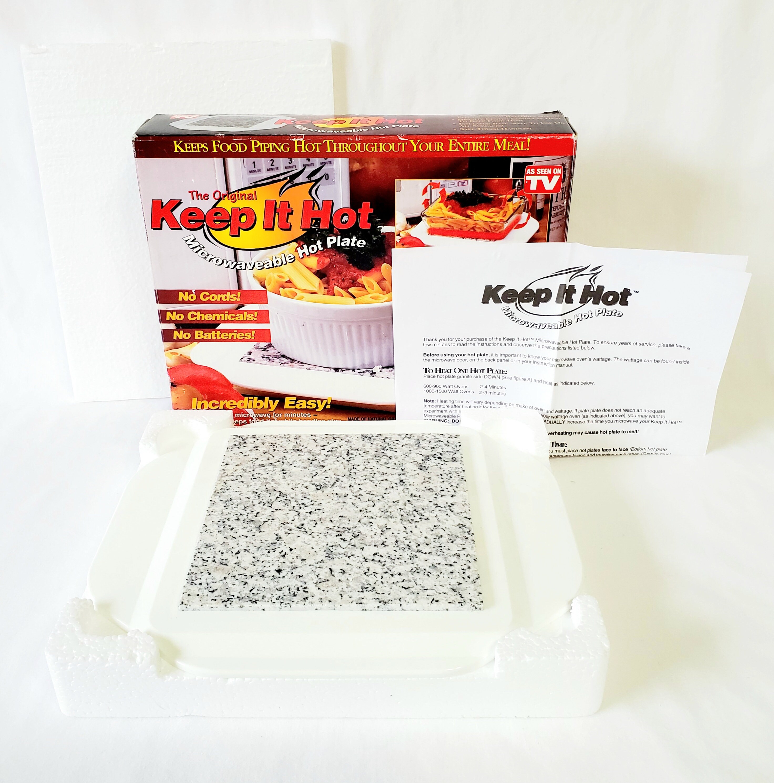 The Original KEEP IT HOT Microwaveable Hot Plate is New in Box. Solid