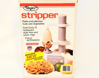 Dazey Stripper Small Appliance Peels and Juliennes Fruits and Vegetables. Fully automatic, new and unused in the original box. Recipes, too!
