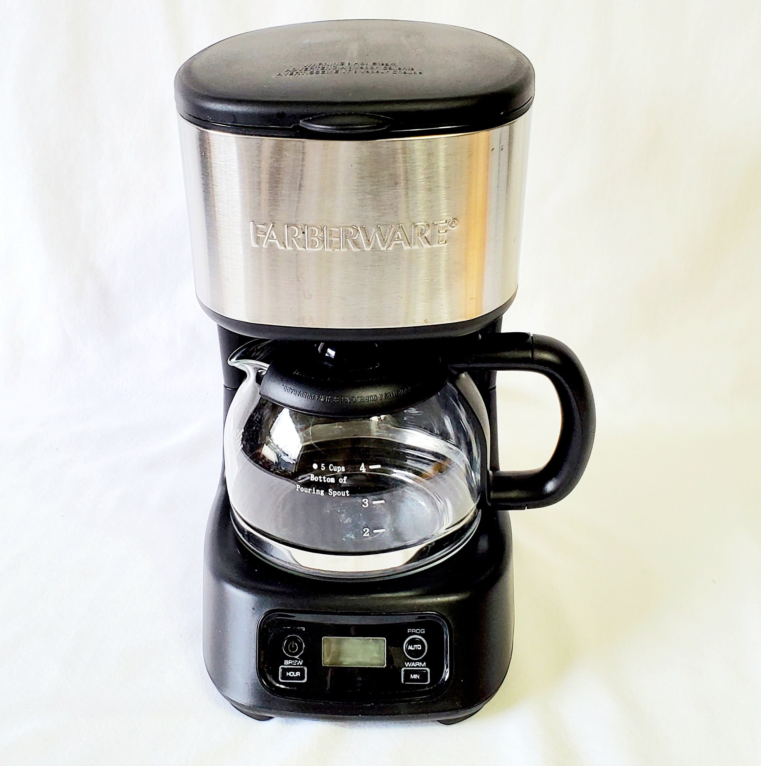 Vintage Farberware 5 Cup Coffee Maker is in Great, Clean Condition.  Electric, Built in Filter. Small Size and It Works Great 