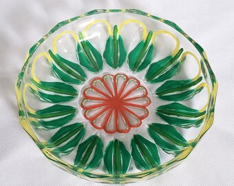 Round, raised and beveled edge vintage dish is hand painted in green, red and yellow. It's summery, food safe and great for parties