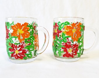 Hand painted vintage glass mugs with handles are have red, orange and yellow flowers with bright green leaves and vines. Fun and food safe!