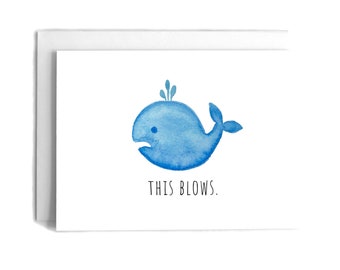 May include: A watercolor illustration of a blue whale blowing water out of its blowhole. The whale is facing left and has a small eye. The text "THIS BLOWS." is below the whale.