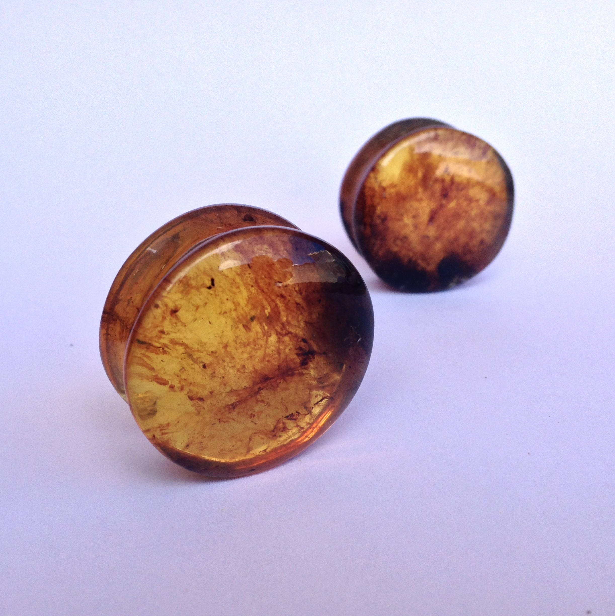 Pair of Natural Amber Agate Concave Stone Saddle Plug Pair of Natural Amber Agate Concave Stone Saddle Plug