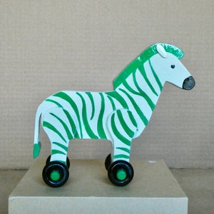 Wooden Zebra rolling toy on wheels