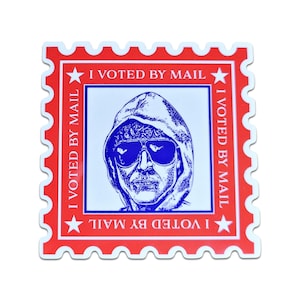 May include: A red, white and blue sticker with a stylised image of a person wearing a hooded sweatshirt and sunglasses. The sticker has the text "I VOTED BY MAIL" repeated four times around the border.