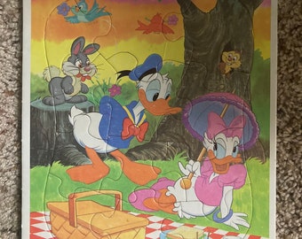 Disneys Donald and Daisy Duck frame puzzle