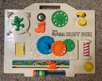 1960s Disney baby musical busy board