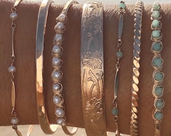 BRACCIALE SPESSO CON MOTIVO FLOREALE / Bracciale rigido in oro, placcato oro 14 carati, argento sterling