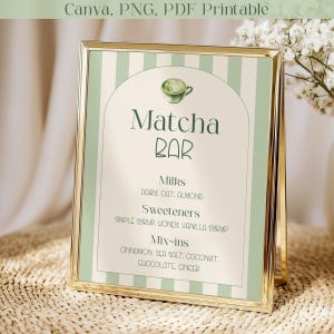 May include: A gold-framed sign with a green and white striped background. The sign reads "Matcha Bar" with a matcha cup illustration. It lists milk, sweetener, and mix-in options. The text "Canva, PNG, PDF Printable" is at the top.