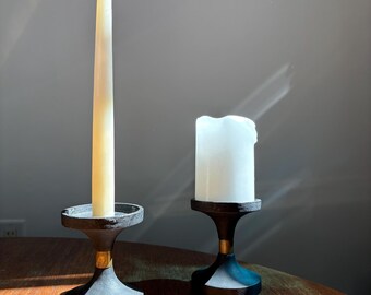 Pair of mid century cast iron and brass candle holders taper or pillar size JPN