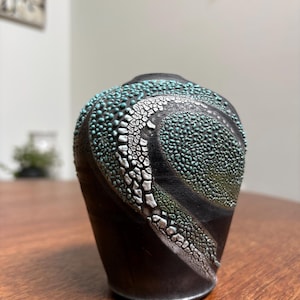 Exceptional Studio pottery raku vase black ground turquoise texture