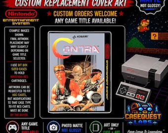 May include: Custom replacement cover art for a Nintendo NES game case featuring the Contra game title. The artwork displays two muscular characters with weapons, a creature, and the Konami logo. Includes a gray NES console and controller.