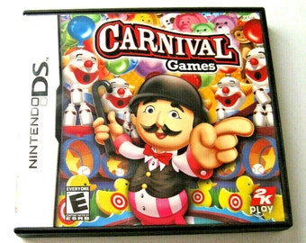 May include: A Nintendo DS game cartridge for Carnival Games. The front of the case features a cartoon character in a red and white striped shirt and a black hat, pointing to the right. The game is rated E for Everyone by the ESRB.