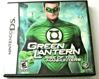 May include: Green Lantern video game cartridge for the Nintendo DS. The cover features a green and black illustration of Green Lantern, the text "Green Lantern", and the words "Rise of the Manhunters".
