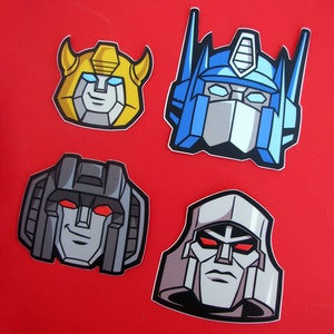 Adesivo Optimus Prime Megatron Transformers com cabeça cortada para laptop, skate, veículo e muito mais!