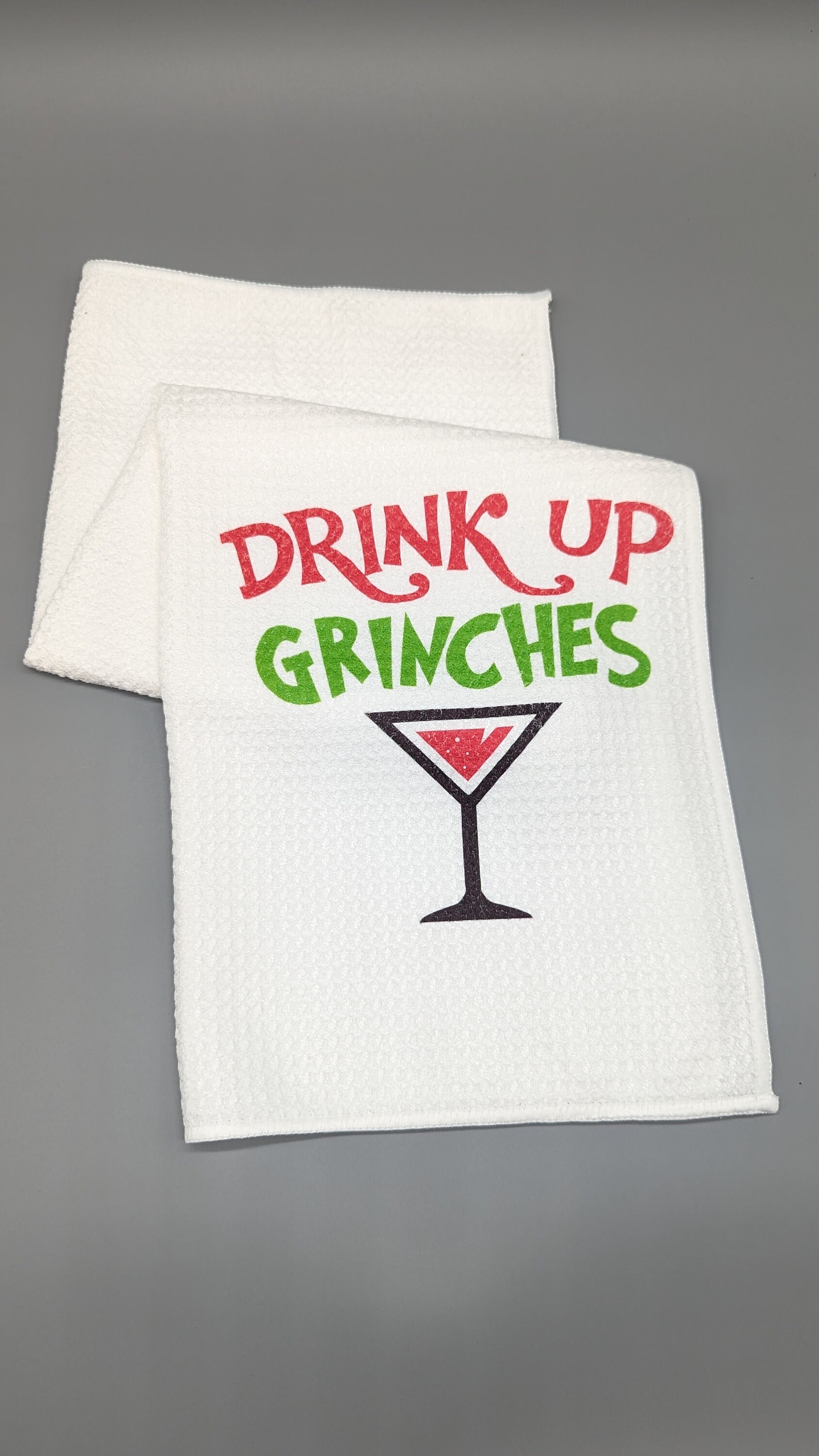 Drink Up Grinches towel