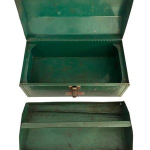 May include: A vintage green metal toolbox with a hinged lid and a separate tray. The toolbox has a worn, distressed look and is made of sturdy metal.