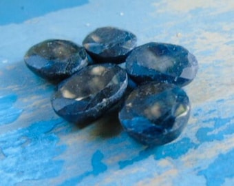 five oval sapphire stones