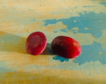 pair of oval ruby gemstones