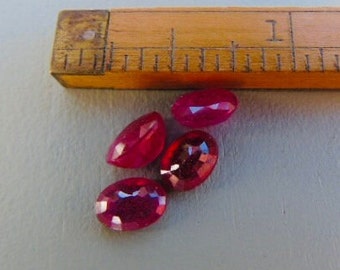 four small oval rubies faceted 4.8 ct
