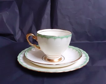 Plant Tuscan Tea Trio in Ivory Bone China With Green Borders and Gilded Trims