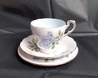 Paragon Vintage 'Blue Moon' Tea Trio for Afternoon Tea With Blue Roses & Gold Trims on White China