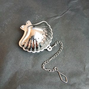 Infusor de chá em aço inoxidável em formato de concha para chá de folhas soltas