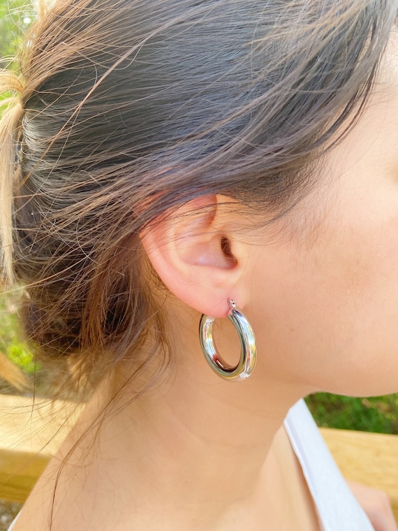 Big silver hoop earrings 