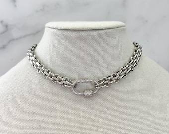 Collana con moschettone in oro, collana in oro massiccio, collana a doppia catena in oro, collana con moschettone in oro pavé, collana con catena a maglie in oro, catena massiccia