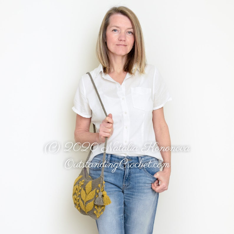 Crochet bag pattern: shoulder, cross-body embossed crochet multicolored bag with 3D leaves and branches, embellished by tassels and spiral cord strap.