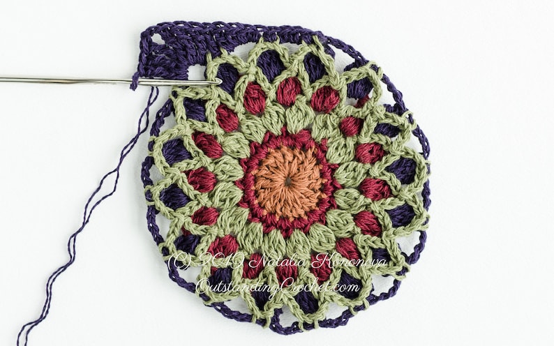 First Light Crochet Motif Pattern (multicolored square motif with a mandala design in the center) with written instructions, charts, and videos.