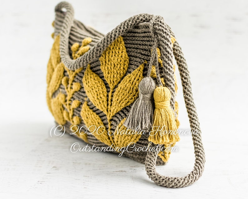 Crochet bag pattern: shoulder, cross-body embossed crochet multicolored bag with 3D leaves and branches, embellished by tassels and spiral cord strap.