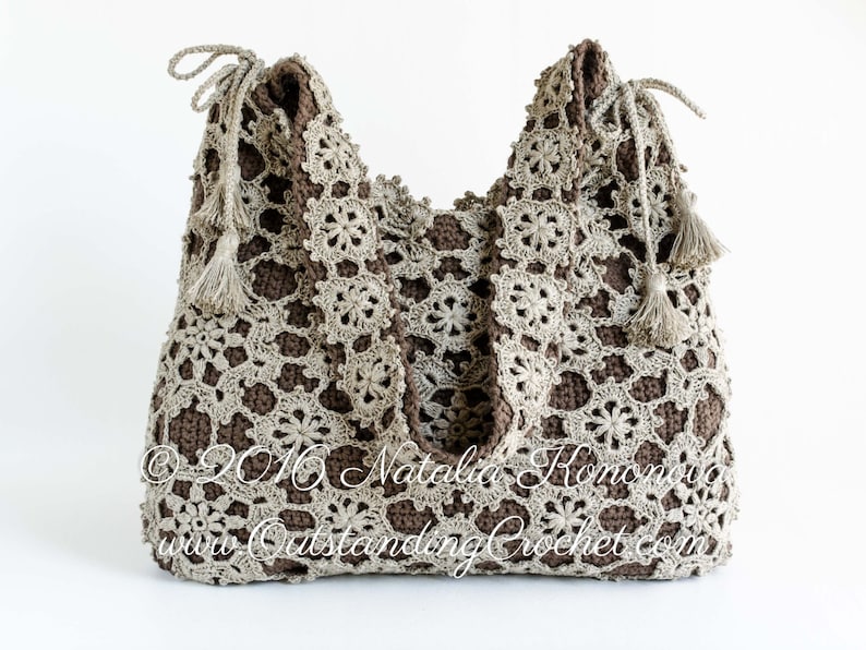 Crochet pattern: Window Frost crochet lace shoulder bag made with joined as you go motifs and solid inner bag. Decorated with a drawstring at the upper edge and tassels.
