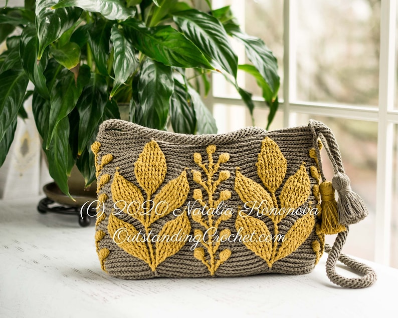 Crochet bag pattern: shoulder, cross-body embossed crochet multicolored bag with 3D leaves and branches, embellished by tassels and spiral cord strap.