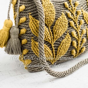 Crochet bag pattern: shoulder, cross-body embossed crochet multicolored bag with 3D leaves and branches, embellished by tassels and spiral cord strap.