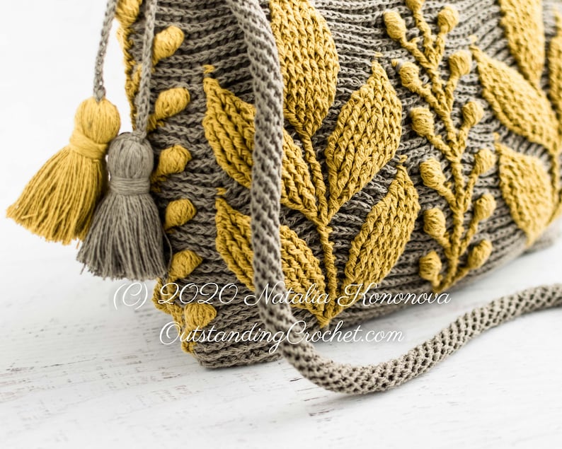 Crochet bag pattern: shoulder, cross-body embossed crochet multicolored bag with 3D leaves and branches, embellished by tassels and spiral cord strap.