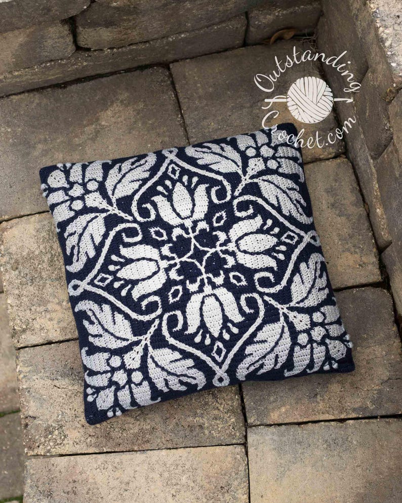Petalique Pillows mosaic crochet pattern: smaller without a border and larger with a border. Made from the center without any tails to hide.  Features delicate flowers and leaves on the front with a plain back. Can be made as a wall hanging.