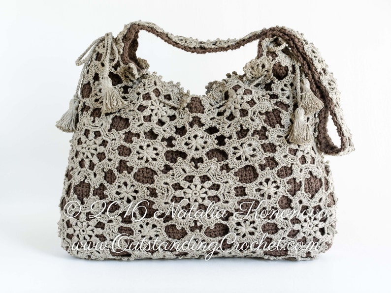 Crochet pattern: Window Frost crochet lace shoulder bag made with joined as you go motifs and solid inner bag. Decorated with a drawstring at the upper edge and tassels.