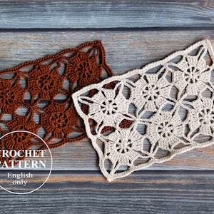 May include: Two crochet squares, one brown and one white, with a floral pattern. The text "CROCHET PATTERN English only" is on a white circle.