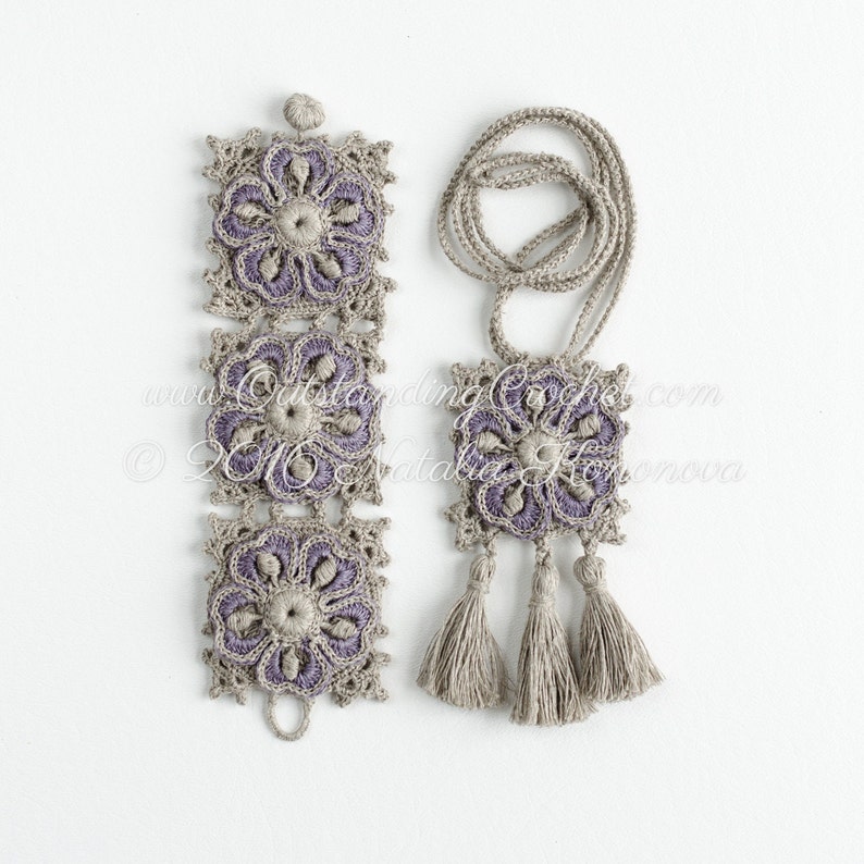 May include: A set of crocheted jewelry featuring a purple and beige color scheme. The set includes a bracelet with three square motifs and a necklace with one square motif and three tassels.