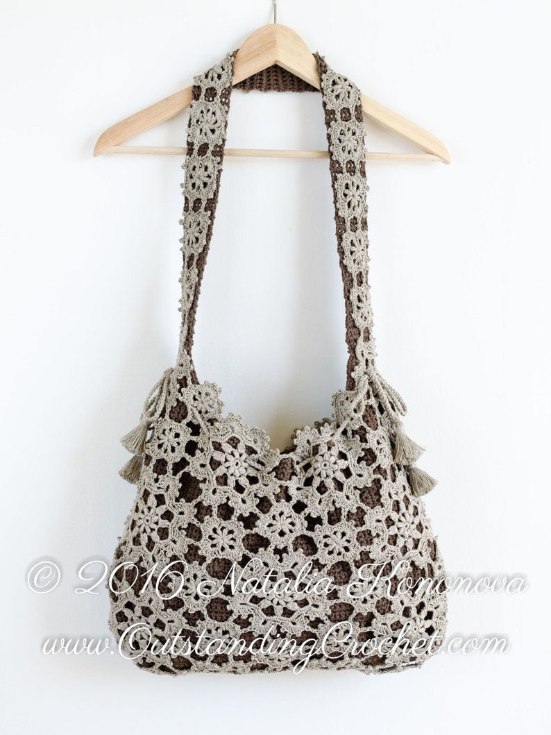 Crochet pattern: Window Frost crochet lace shoulder bag made with joined as you go motifs and solid inner bag. Decorated with a drawstring at the upper edge and tassels.