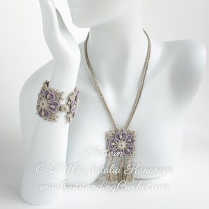May include: A crocheted necklace and bracelet set with a purple flower design and tassels. The necklace and bracelet are made with a beige yarn. The text "Pattern &copy; 2016 Natalia Kononova www.OutstandingCrochet.com" is visible in the image.
